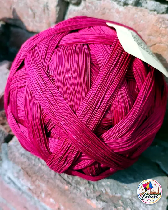 Magenta pinna with tag
